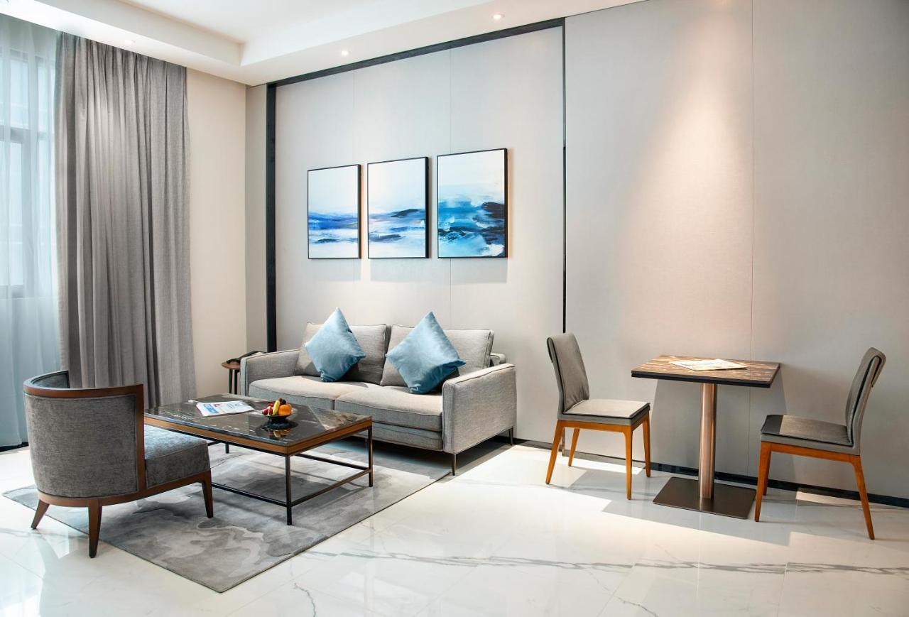 Asiana Grand Hotel Dubaï Extérieur photo A living room at the hotel
