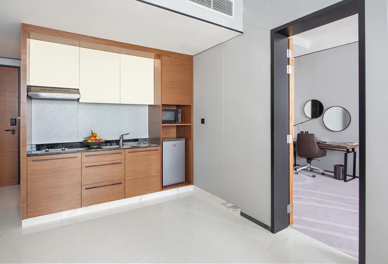 Asiana Grand Hotel Dubaï Extérieur photo A kitchenette in a hotel
