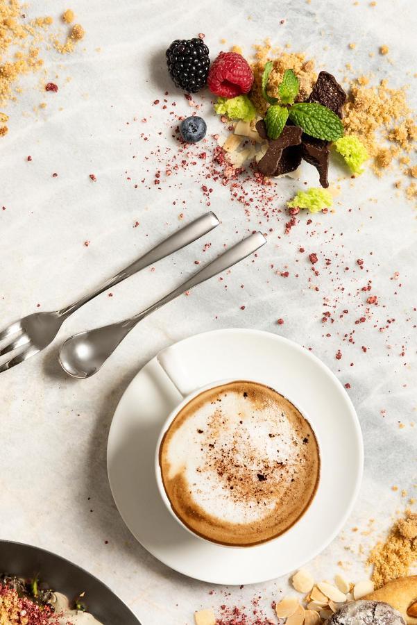 Asiana Grand Hotel Dubaï Extérieur photo A cup of coffee